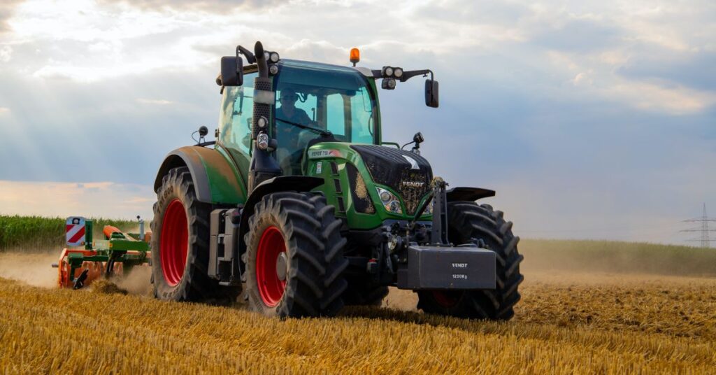 An operator is driving a tractor