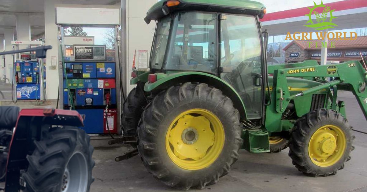 John Deere tractor and Massey Ferguson at fuel station.